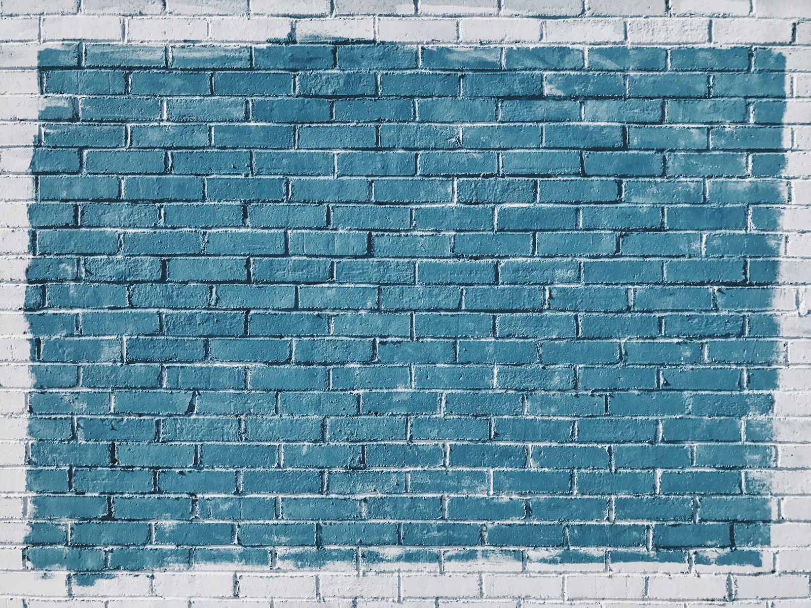 Photo by Patrick Tomasso gray concrete bricks painted in blue